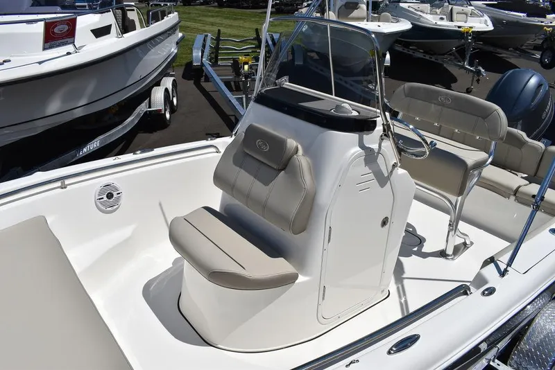 Slide: The Image of 2024 Key West 189 FS boat interior with seating and console. - 11