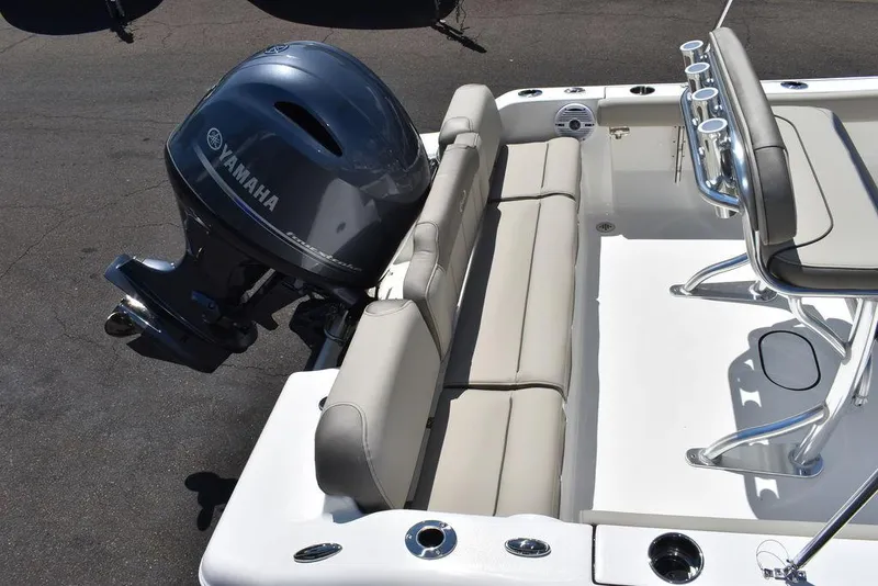 Slide: The Image of 2024 Key West 189 FS boat with Yamaha outboard motor and cushioned seating. - 23
