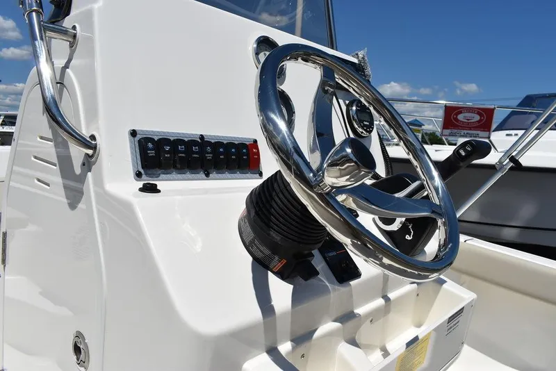 Slide: The Image of Close-up of 2024 Key West 189 FS boat steering wheel and control panel. - 26