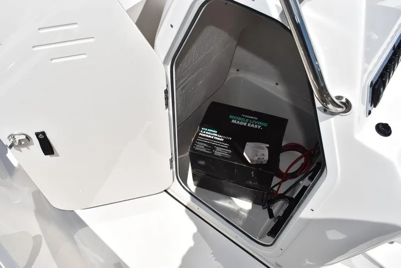 Slide: The Image of 2024 Key West 189 FS storage compartment with marine equipment. - 28