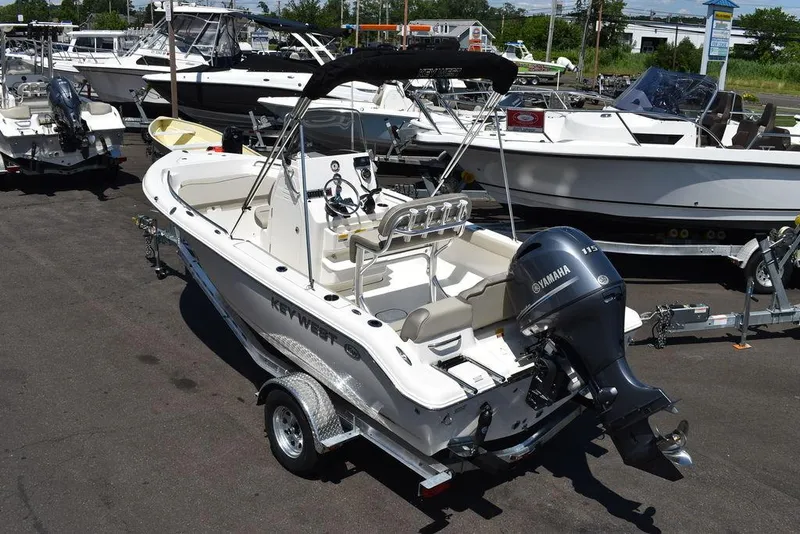 Slide: The Image of 2024 Key West 189 FS boat with Yamaha outboard motor on trailer. - 3