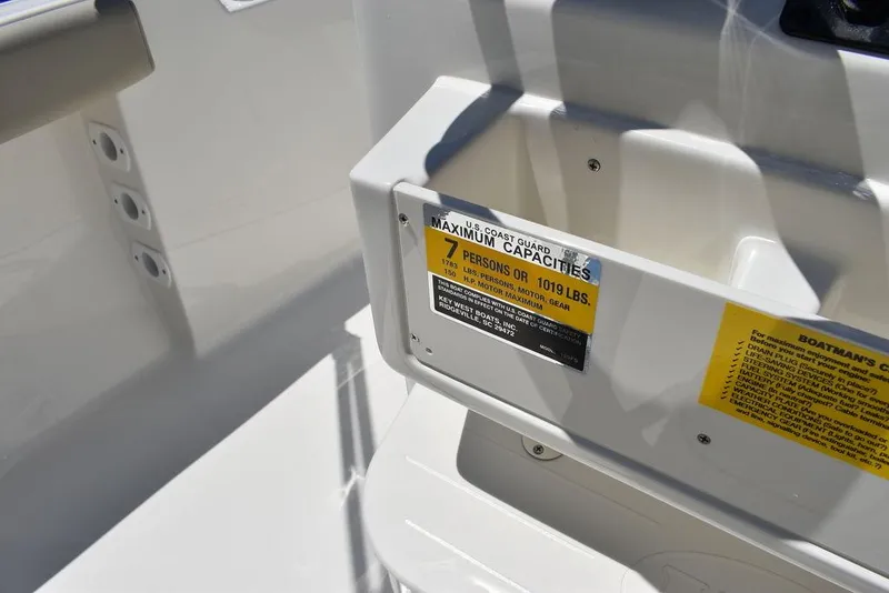 Slide: The Image of 2024 Key West 189 FS boat capacity label showing a maximum of 7 persons or 1019 lbs. - 36