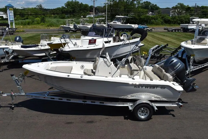 Slide: The Image of 2024 Key West 189 FS boat on trailer in outdoor showroom. - 4