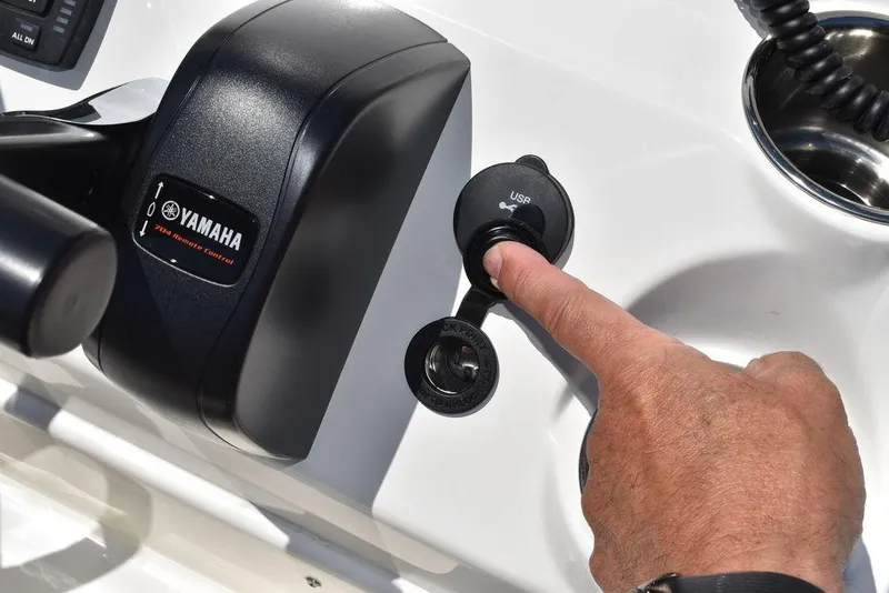 Slide: The Image of Close-up of 2024 Key West 189 FS boat's Yamaha control panel and USB port. - 44
