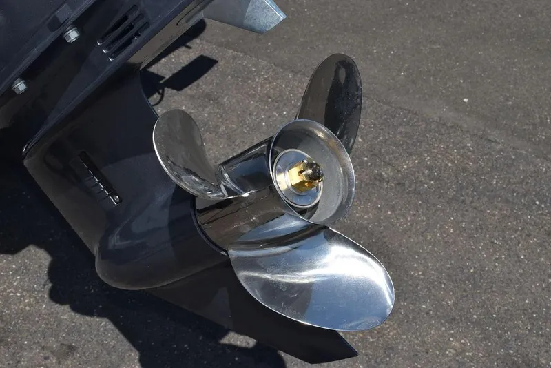 Slide: The Image of 2024 Key West 189 FS boat propeller close-up on asphalt background. - 48