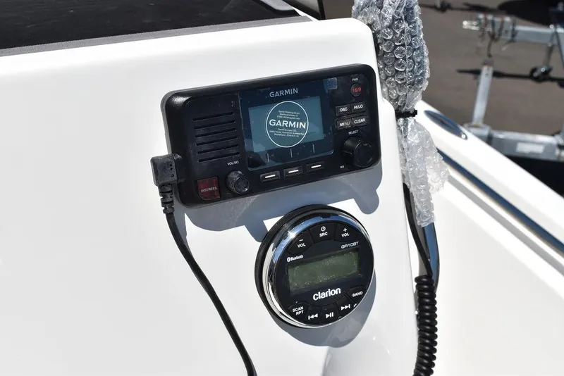 Slide: The Image of Garmin and Clarion electronics on 2024 Key West 189 FS boat console. - 9