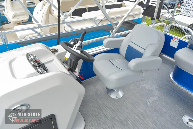 Slide: The Image of 2024 Lowe Ultra 200 Cruise boat interior with steering console and captain's chair. - 15