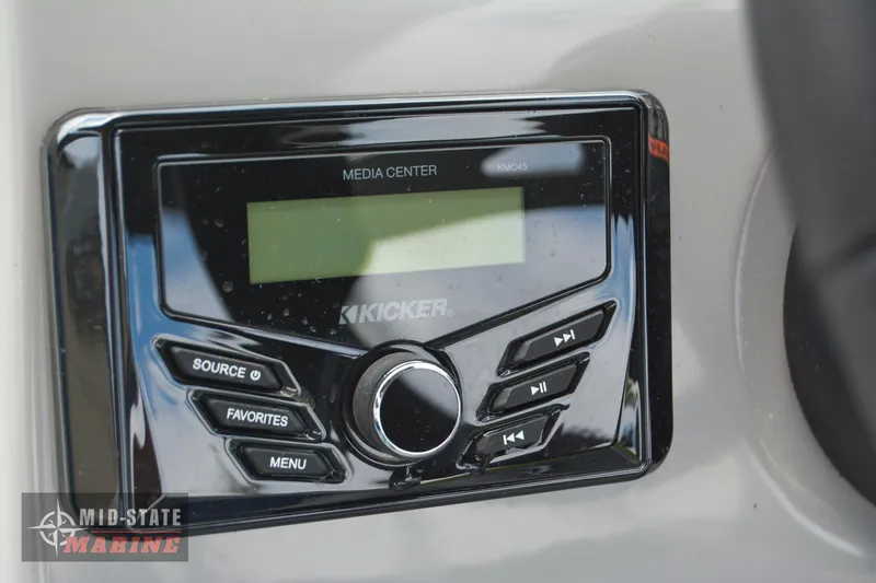 Slide: The Image of 2024 Lowe Ultra 200 Cruise media center with Kicker audio system. - 18