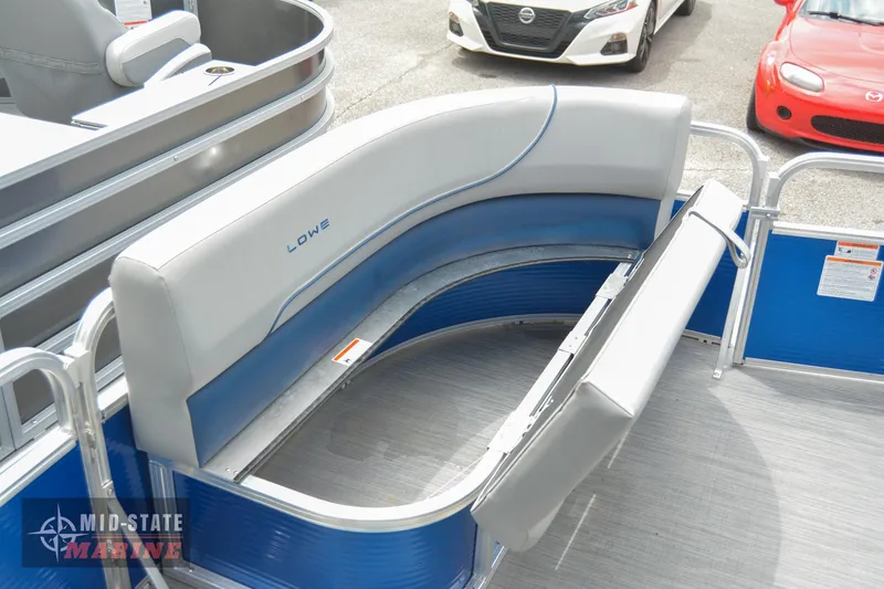 Slide: The Image of 2024 Lowe Ultra 200 Cruise pontoon boat with gray and blue seating. - 20