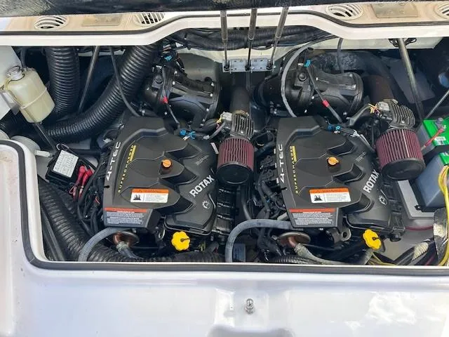 Slide: The Image of Twin Rotax engines in a 2016 Scarab 215 HO Impulse boat. - 12