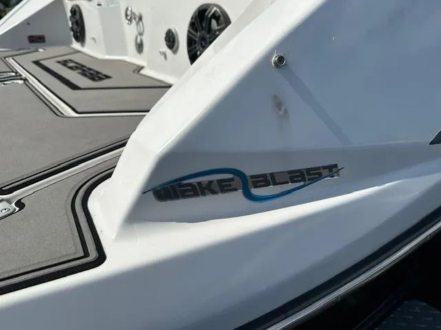 Slide: The Image of Close-up of 2016 Scarab 215 HO Impulse boat with Wake Blast logo. - 18