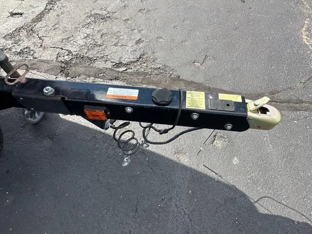 Slide: The Image of Trailer hitch of a 2016 Scarab 215 HO Impulse boat. - 19