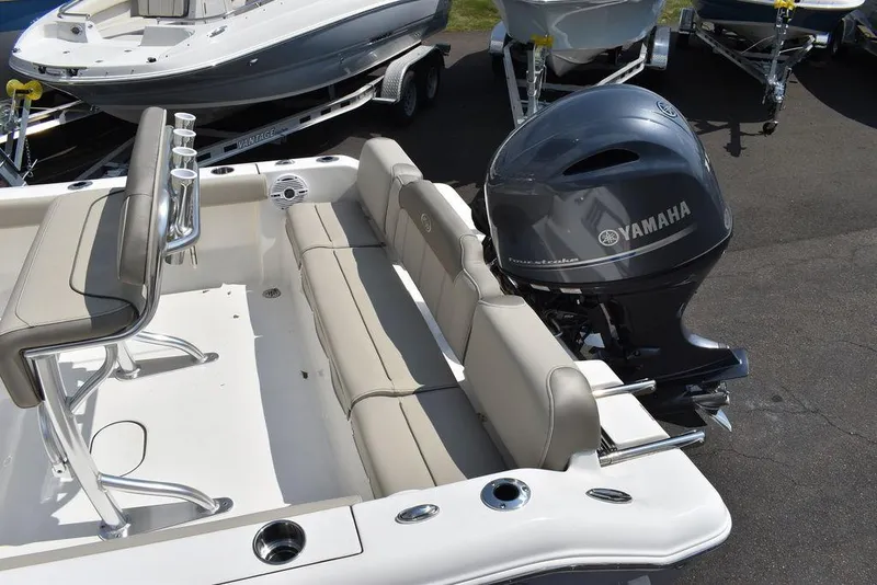 Slide: The Image of 2024 Key West 189 FS boat with Yamaha outboard motor, featuring comfortable seating. - 13
