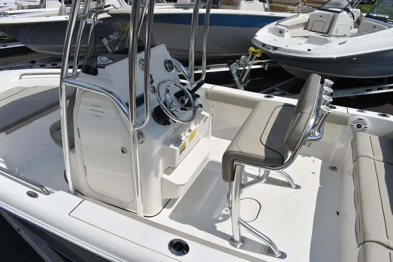 Slide: The Image of 2024 Key West 189 FS boat interior with console and seating. - 14