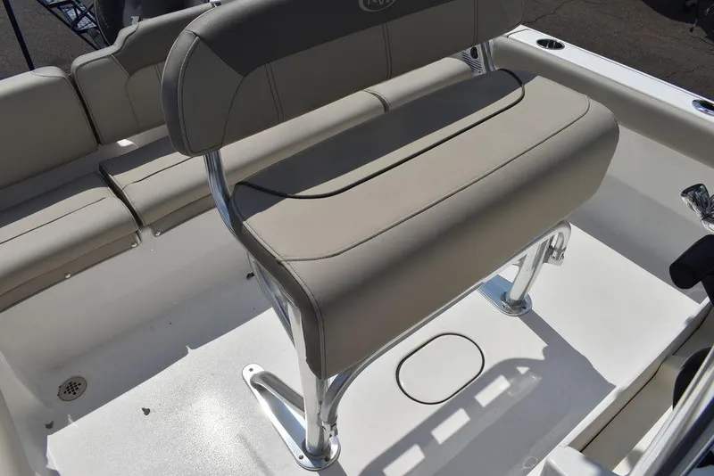 Slide: The Image of 2024 Key West 189 FS boat seating with beige upholstery and stainless steel frame. - 23