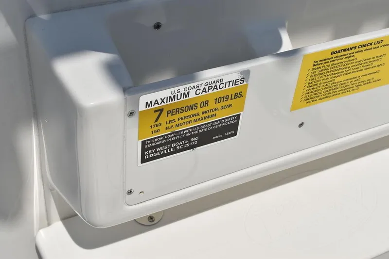 Slide: The Image of 2024 Key West 189 FS boat capacity label, maximum 7 persons or 1019 lbs. - 29
