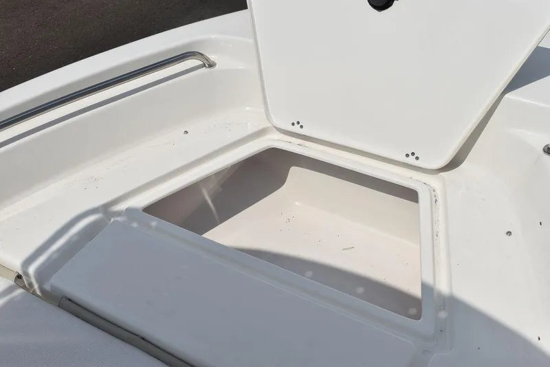 Slide: The Image of 2024 Key West 189 FS boat storage compartment with open hatch. - 35