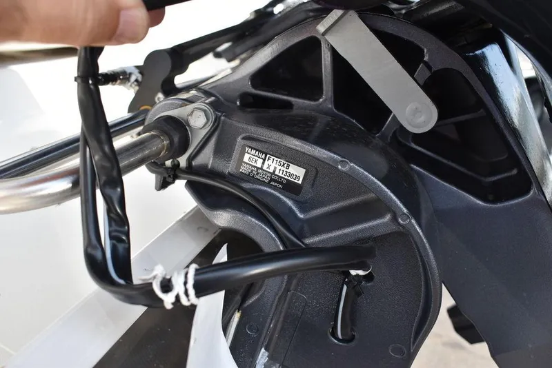 Slide: The Image of Close-up of a 2024 Key West 189 FS boat engine component. - 39