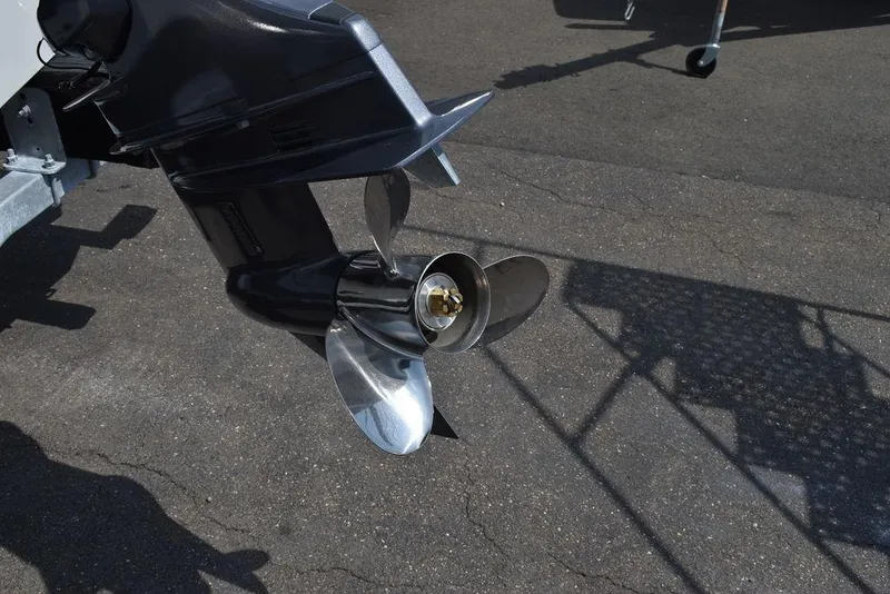 Slide: The Image of 2024 Key West 189 FS boat propeller on asphalt surface. - 40