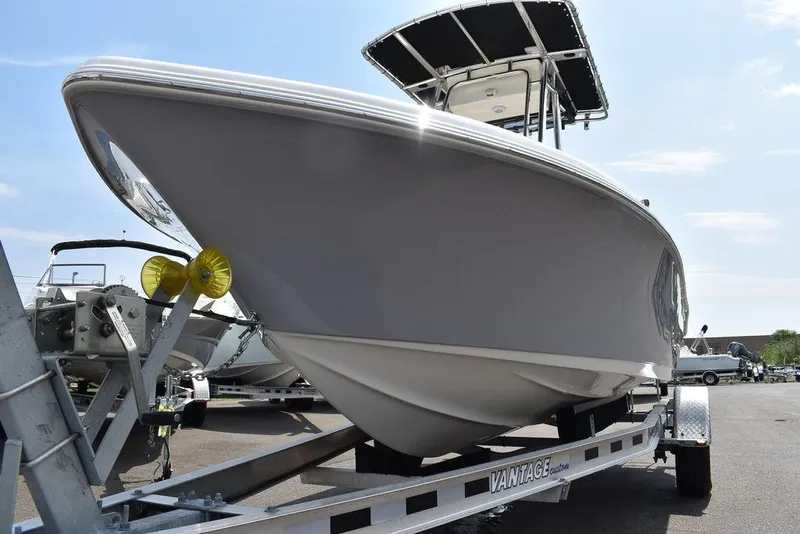 Slide: The Image of 2024 Key West 189 FS boat on trailer, side view under sunny sky. - 43
