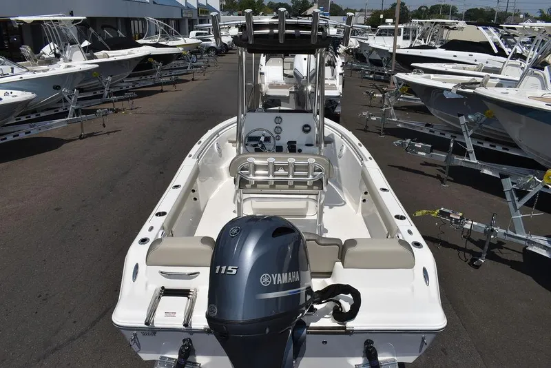 Slide: The Image of 2024 Key West 189 FS boat with Yamaha 115 engine in a dealership lot. - 6