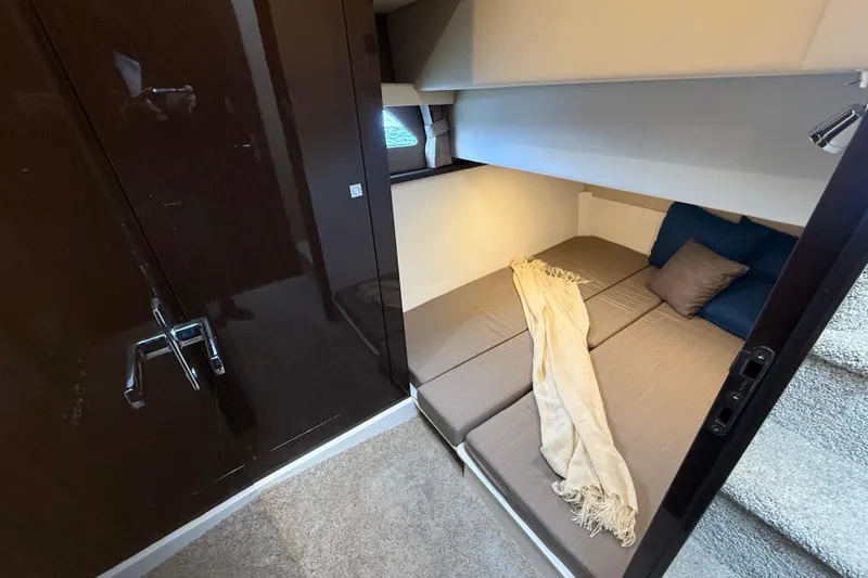 Slide: The Image of Interior cabin of 2020 Carver C37 Coupe with cozy bed and modern design. - 40