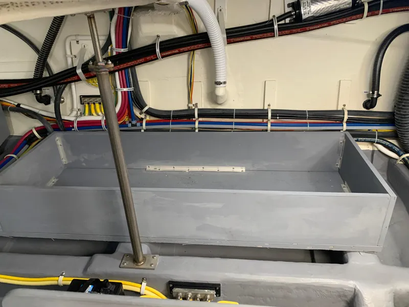 Slide: The Image of Engine compartment of a 2020 Carver C37 Coupe with organized wiring. - 43