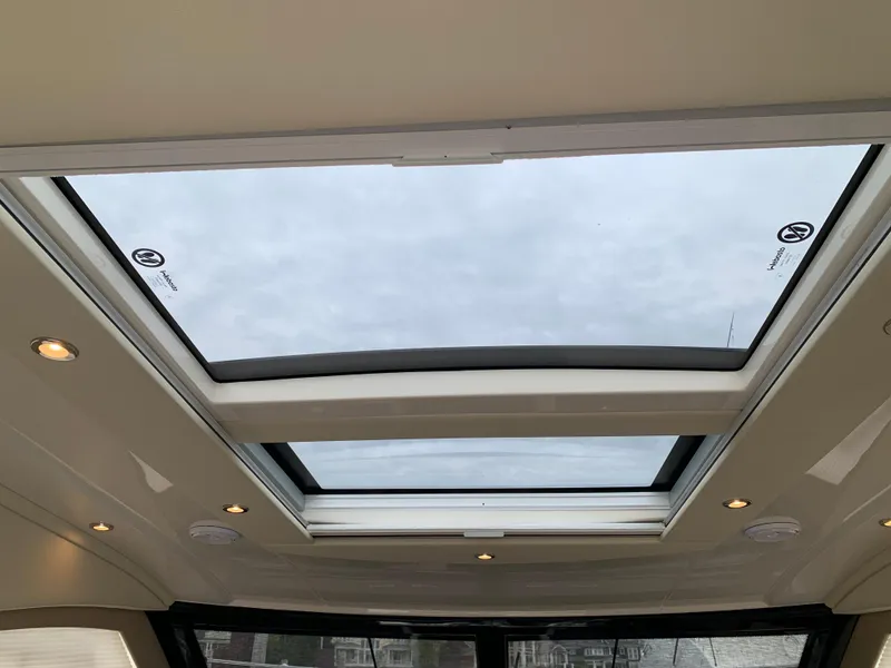 Slide: The Image of 2020 Carver C37 Coupe sunroof with panoramic view and interior lighting. - 25