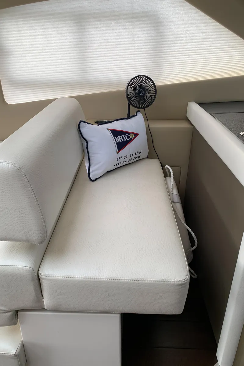 Slide: The Image of Interior seating of 2020 Carver C37 Coupe with cushion and fan. - 30