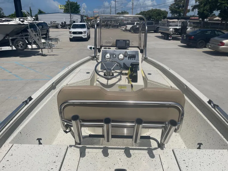 Slide: The Image of 2018 Express H20 Bay boat, center console view in a parking lot. - 9