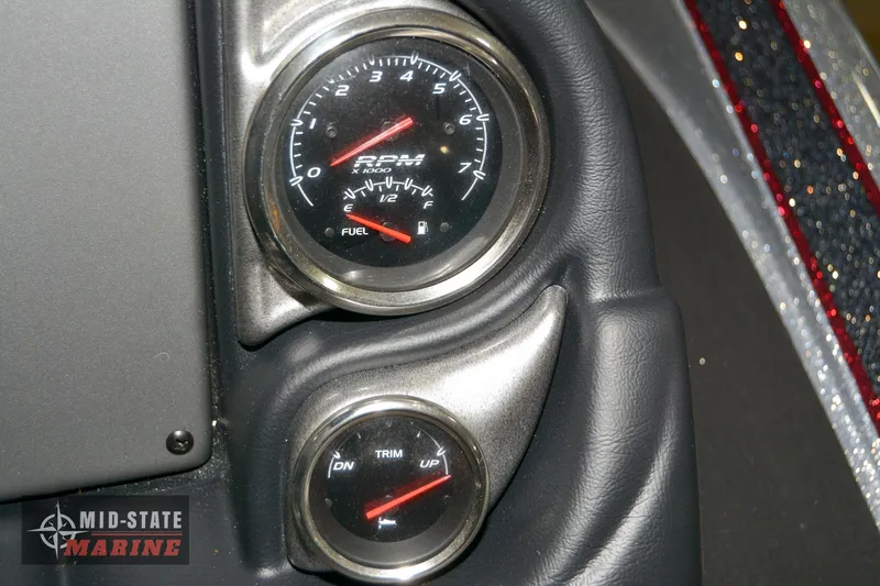 Slide: The Image of Triton 18 TrX 2024 dashboard with RPM and trim gauges, Mid-State Marine logo. - 12