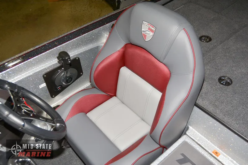 Slide: The Image of 2024 Triton 18 TrX boat seat with red and gray upholstery. - 15