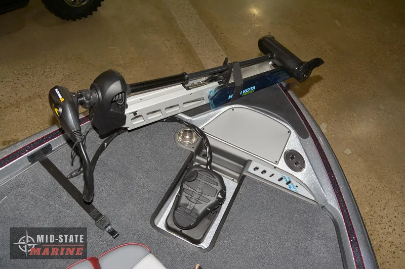 Slide: The Image of 2024 Triton 18 TrX boat with trolling motor and foot pedal controls. - 18
