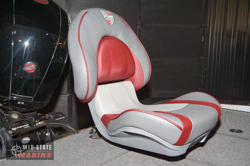 Slide: The Image of 2024 Triton 18 TrX boat seat with red and gray upholstery. - 20