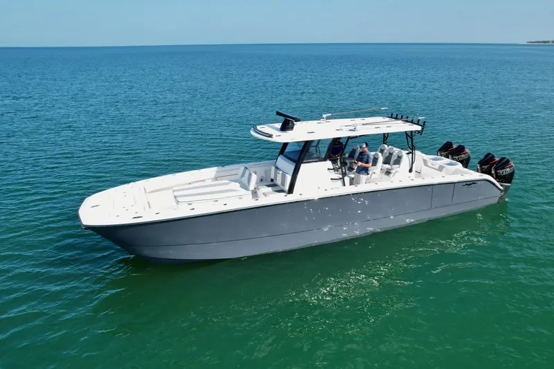 Slide: The Image of 2022 Invincible 40 Catamaran on open water. - 2