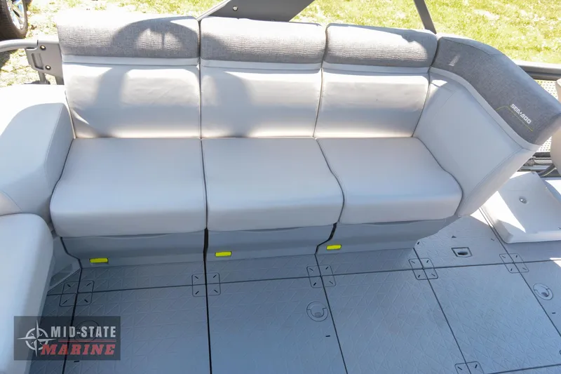 Slide: The Image of 2023 Sea-Doo Switch Sport 21 interior seating, gray upholstery, Mid-State Marine. - 10