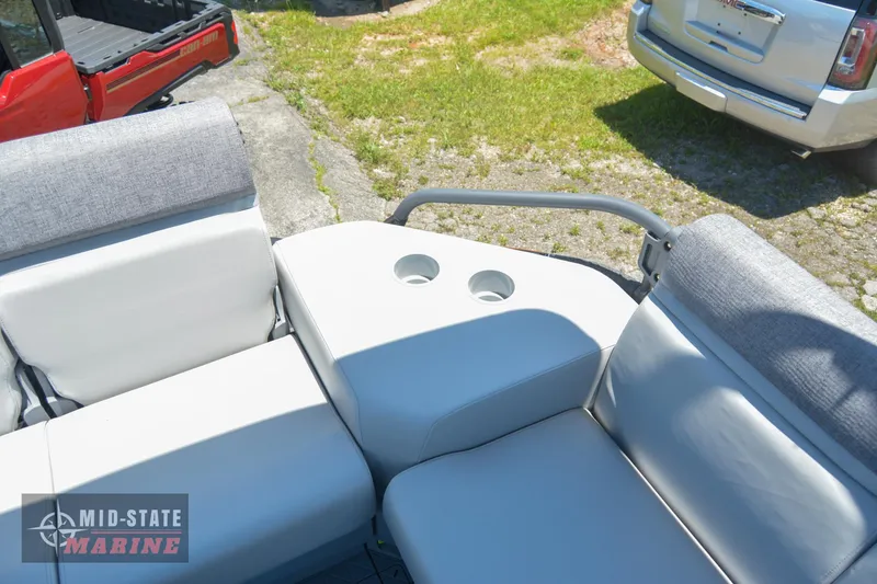 Slide: The Image of 2023 Sea-Doo Switch Sport 21 boat seating area with cup holders. - 22