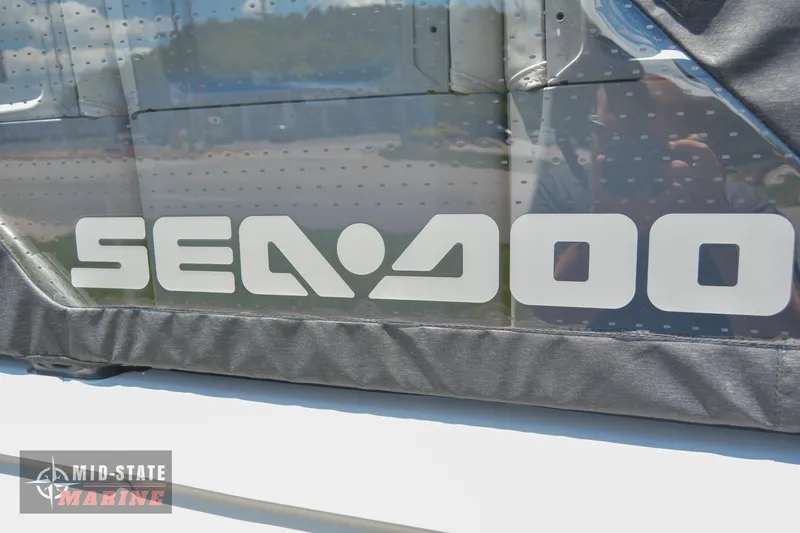 Slide: The Image of 2023 Sea-Doo Switch Sport 21 logo on boat exterior. - 5