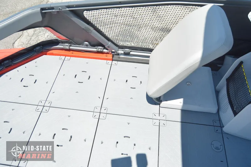 Slide: The Image of 2023 Sea-Doo Switch Sport 21 deck and seating area. - 9