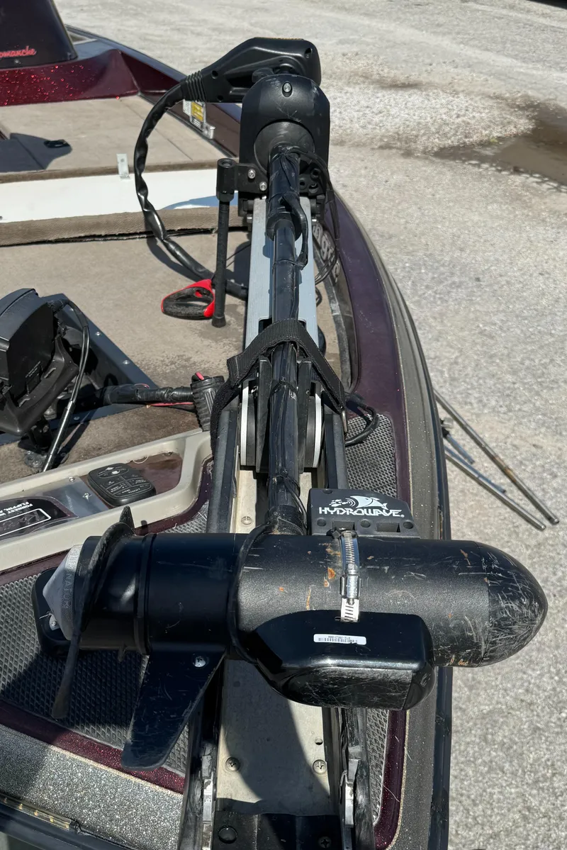 Slide: The Image of 2001 Ranger 520DVX Comanche boat with mounted trolling motor on deck. - 9