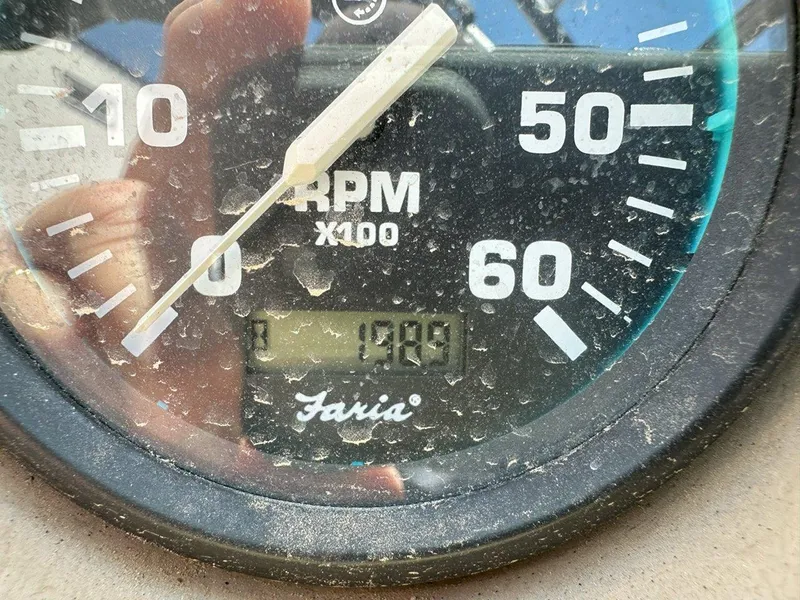 Slide: The Image of Close-up of a dusty RPM gauge from a 1999 Centurion Elite-V C4 boat. - 13