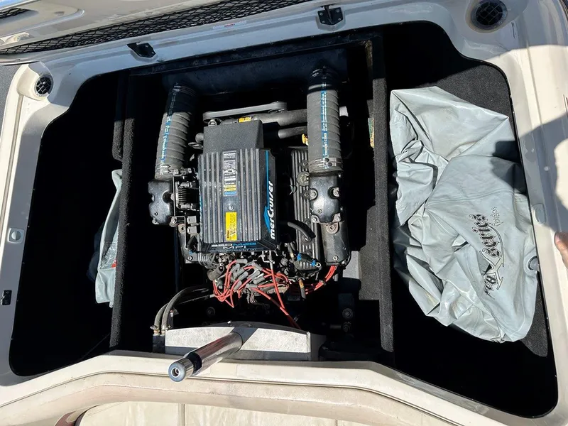 Slide: The Image of 1999 Centurion Elite-V C4 engine compartment with MerCruiser engine visible. - 21