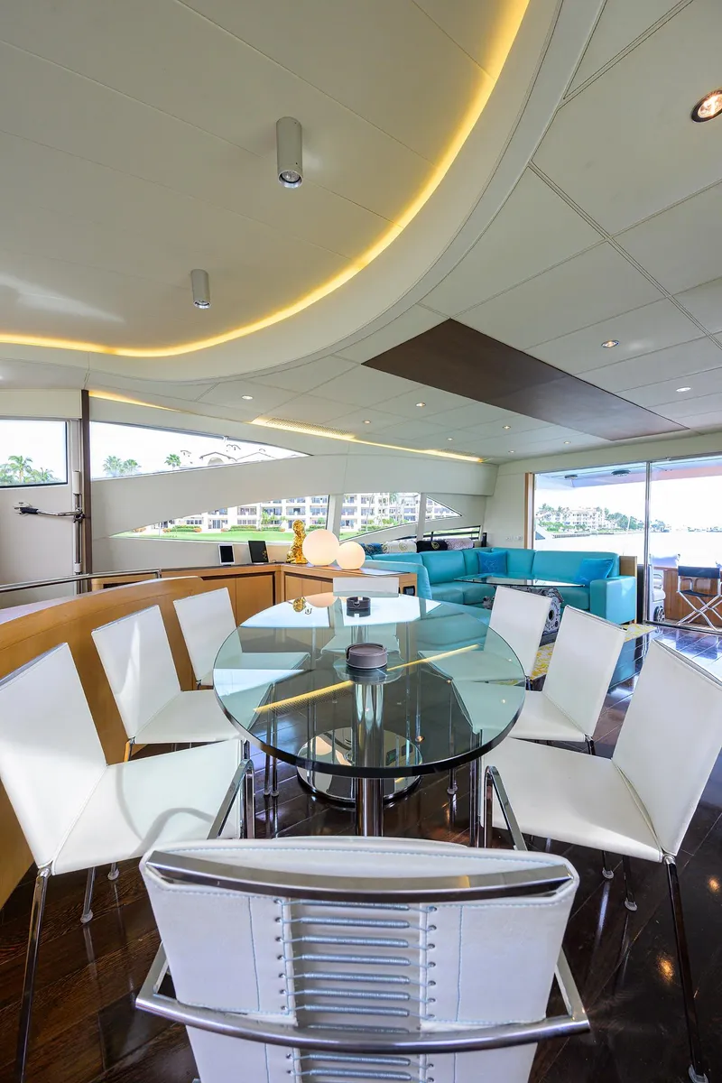 Slide: The Image of Luxurious interior of 2009 Pershing 90 Express yacht with modern dining area. - 12