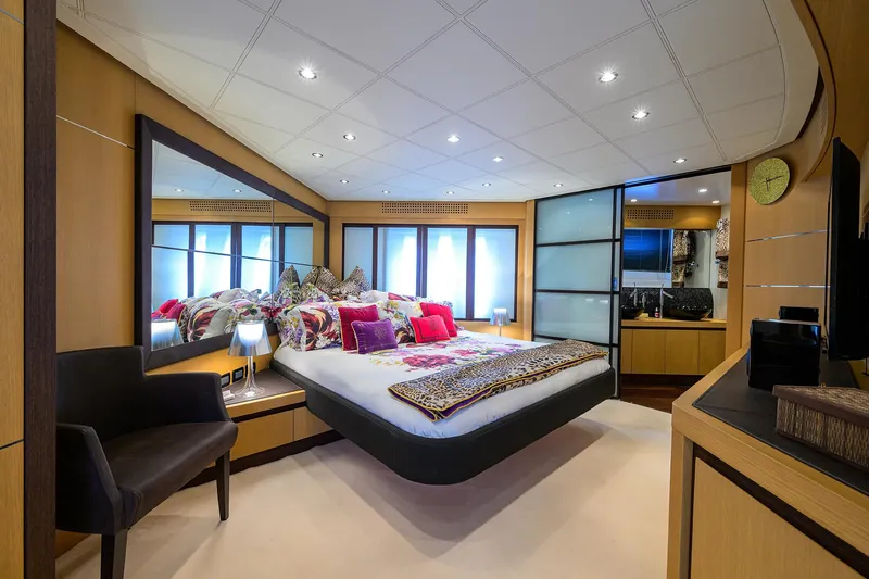 Slide: The Image of Luxurious bedroom interior of 2009 Pershing 90 Express yacht with modern decor. - 20