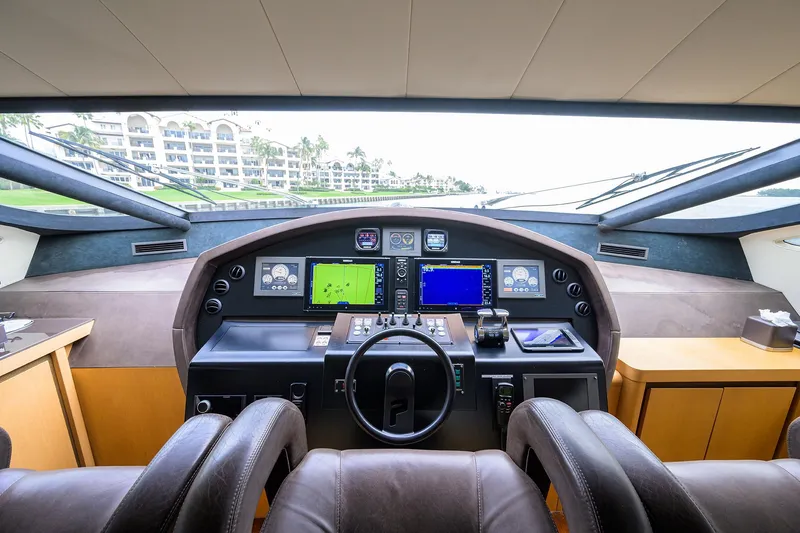 Slide: The Image of Cockpit of 2009 Pershing 90 Express yacht with modern navigation equipment. - 3