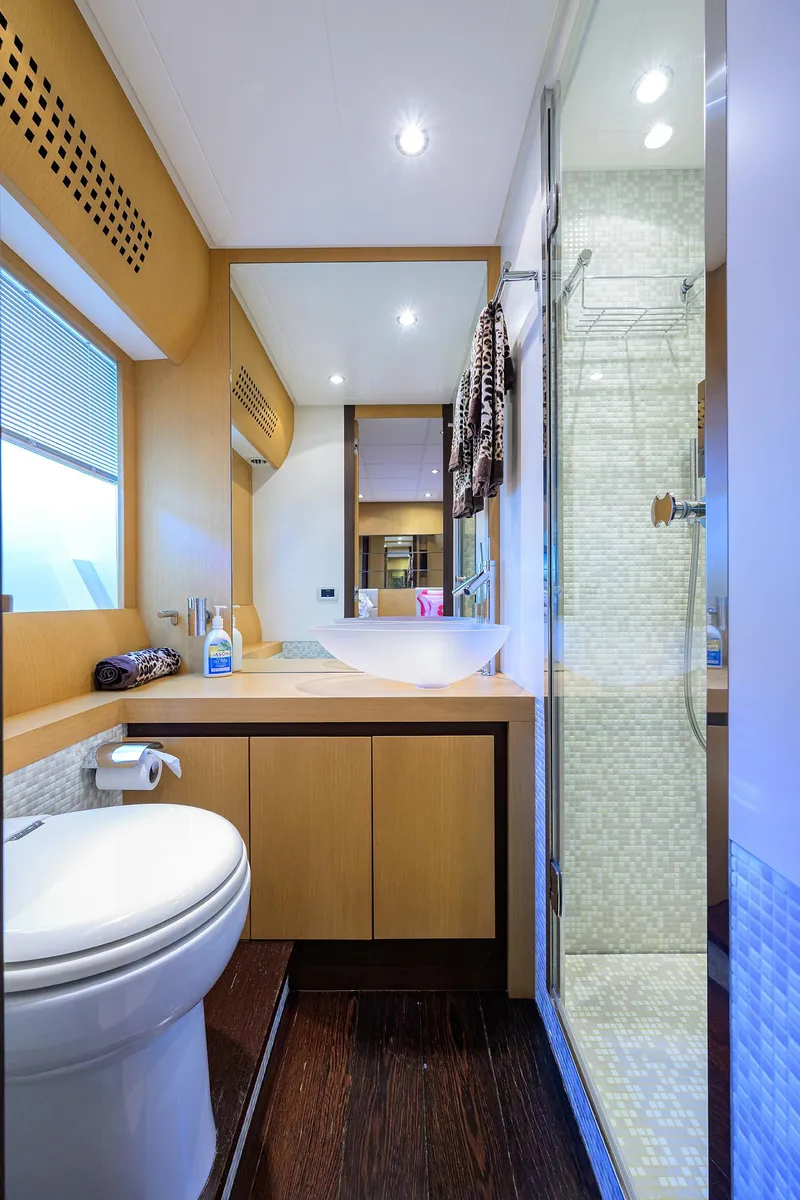 Slide: The Image of Luxurious bathroom in a 2009 Pershing 90 Express yacht with modern fixtures. - 35