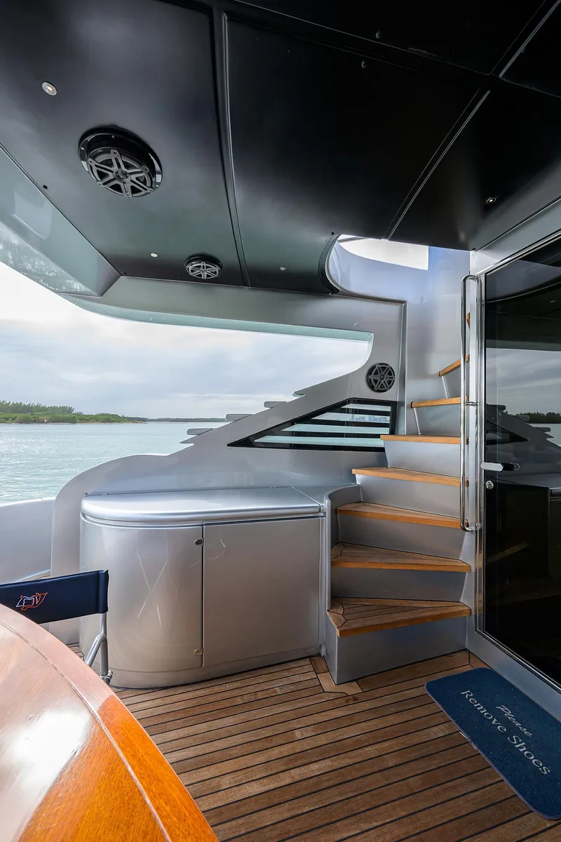 Slide: The Image of 2009 Pershing 90 Express yacht deck with stairs and ocean view - 41