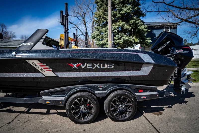 Slide: The Image of 2022 Vexus DVX20 boat on a trailer, side view. - 1