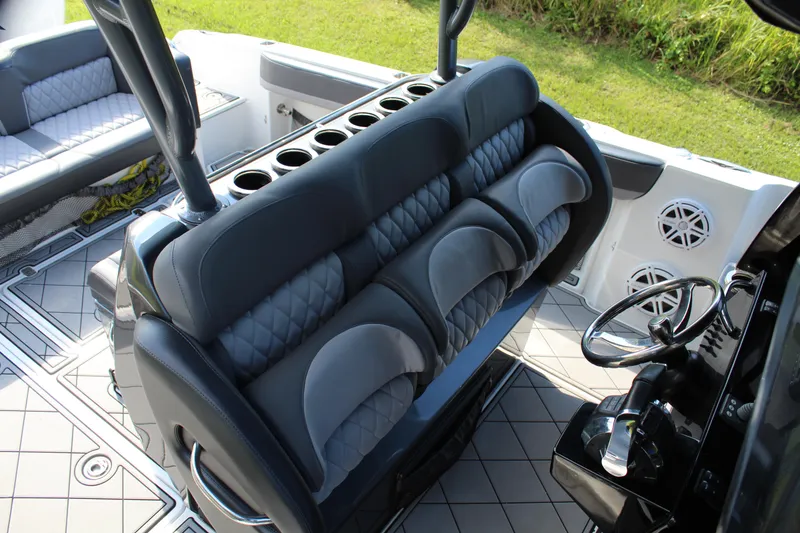Slide: The Image of 2019 Nor-Tech 340 Sport Center Console interior with luxurious seating and modern design. - 42