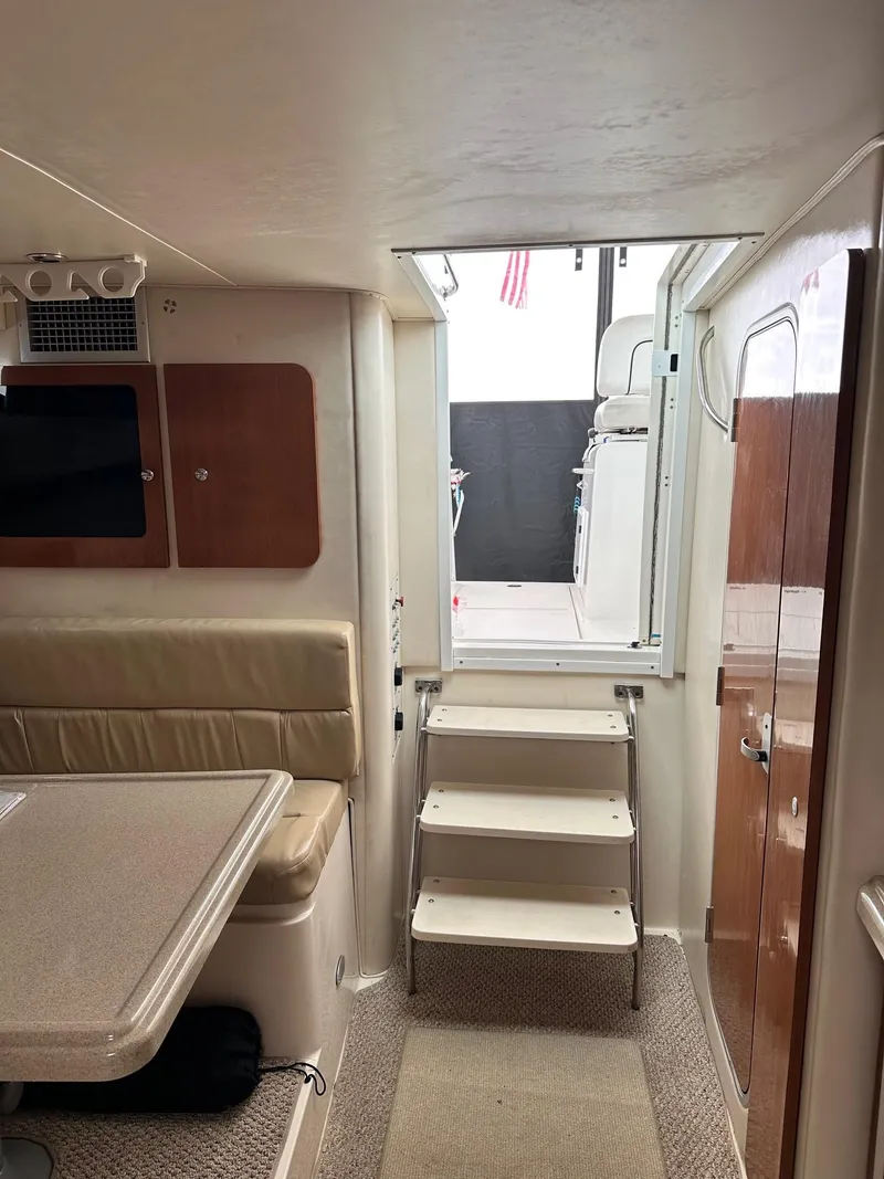 Slide: The Image of Wellcraft 330 Coastal 2004 - 8